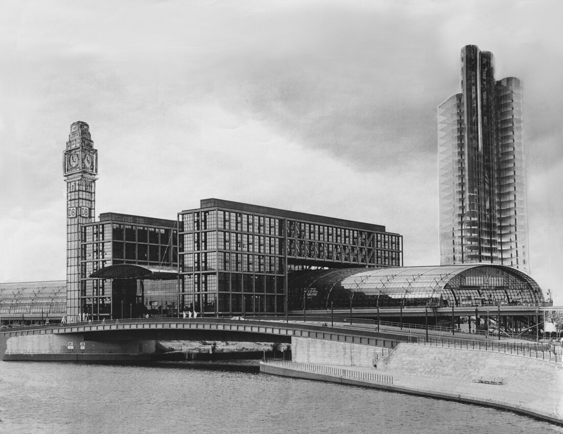 Berlin. Neuer Lehrter Hauptbahnhofs mit gläsernem Hochhaus in Anlehnung des 1922 am Bahnhof Friedreichsstraße geplanten Hochhauses von Mies van der Rohe.
